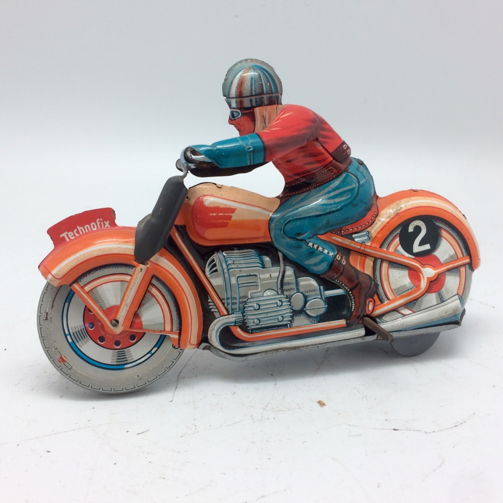  Ancien  jouet  moto  m canique